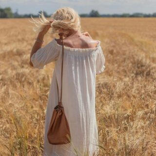 I saw this and stared singing Fields of Gold in my head .I loved Eva Cassidys version her voice was so beautiful . The photo that inspired the memory is from Hollie @florafairweather who is modelling our Evie bag . #dufflebag #leatherbag #wolfieandwillow
